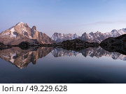 Mountains and Reflection in Lac Blanc Lake at Sunset. Blue Hour, Twilight. Chamonix, French Alps, France. (2023 год). Стоковое фото, фотограф Максим Забаровский / Фотобанк Лори