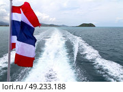 asia myanmar kho samui bay isle waving flag    in thailand and south china sea . Стоковое фото, агентство Ingram Publishing / Фотобанк Лори