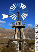 africa windmills and the sky in  isle of lanzarote spain . Стоковое фото, агентство Ingram Publishing / Фотобанк Лори
