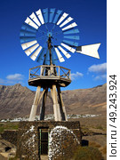 africa windmills and the sky in  isle of lanzarote spain . Стоковое фото, агентство Ingram Publishing / Фотобанк Лори