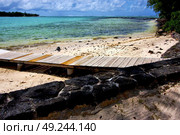  pier blue bay foam footstep indian ocean some stone in the island of deus cocos in mauritius . Стоковое фото, агентство Ingram Publishing / Фотобанк Лори