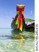 prow thailand  in  kho tao bay asia isle blue clean water    pirogue   and south china sea . Стоковое фото, агентство Ingram Publishing / Фотобанк Лори