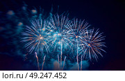 Sky is dotted with fireworks in honor of holiday. Colorful flashes in sky that fascinate attention. Festive fireworks. Стоковое AI-изображение, AI-художник Антон Слабоспицкий / Фотобанк Лори