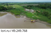 Drone View of Dredging Machinery in the River. Стоковое видео, видеограф ALEJANDRO PEREZ ALVARES / Фотобанк Лори