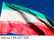 in iran blur  iranian waving flag  the blue sky and wind. Стоковое фото, агентство Ingram Publishing / Фотобанк Лори