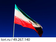 in iran blur  iranian waving flag  the blue sky and wind. Стоковое фото, агентство Ingram Publishing / Фотобанк Лори