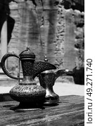in the site of petra jordan the traditional coffe container isolated on a table. Стоковое фото, агентство Ingram Publishing / Фотобанк Лори