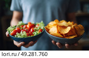 A person is holding two bowls, one containing a salad. Стоковое AI-изображение, AI-художник Ярославский Максим / Фотобанк Лори