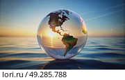 Colorful Globe Reflecting Sunset Over Calm Ocean Waters With Vibrant Colors and Serene Atmosphere. Стоковое AI-видео, аниматор Оксана Медведева / Фотобанк Лори