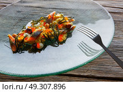 Smoked sardines salad with creamy cheese corn codium and hazelnuts. Стоковое фото, агентство Ingram Publishing / Фотобанк Лори