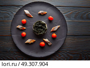 Bota sardine with white garlic pannacotta, codium and osmotized tomatoes. Стоковое фото, агентство Ingram Publishing / Фотобанк Лори
