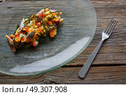Smoked sardines salad with creamy cheese corn codium and hazelnuts. Стоковое фото, агентство Ingram Publishing / Фотобанк Лори