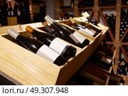 Wine Cellar from Mediterranean with bottles stacked in rows. Стоковое фото, агентство Ingram Publishing / Фотобанк Лори