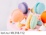 Colorful Macaron Birthday Cake And Sweet Candy Topping. Стоковое фото, агентство Ingram Publishing / Фотобанк Лори