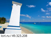 Puerto Morelos old bent lighthouse in Mayan Riviera Maya of Mexico. Стоковое фото, агентство Ingram Publishing / Фотобанк Лори
