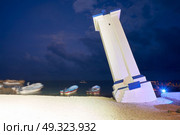 Puerto Morelos old bent lighthouse in Mayan Riviera Maya of Mexico. Стоковое фото, агентство Ingram Publishing / Фотобанк Лори