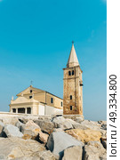 Church of Our Lady of the Angel on the beach of Caorle Italy, Santuario della Madonna dell’Angelo. Стоковое фото, агентство Ingram Publishing / Фотобанк Лори