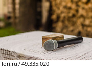 the microphone and box for wedding ruts on the table. Стоковое фото, агентство Ingram Publishing / Фотобанк Лори