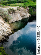 flooded industrial granite career with waterfalls. Стоковое фото, агентство Ingram Publishing / Фотобанк Лори