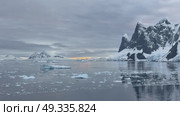 Big Iceberg in Antarctica Winter Scenery, Amazing Shape Ice Formation of Massive Large Enormous Blue Icebergs in Antarctic Peninsula Landscape Seascape with Ocean Sea Water. Стоковое видео, видеограф Vladimir / Фотобанк Лори