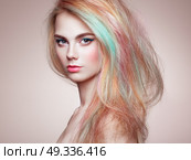 Beauty Fashion Model Girl with Colorful Dyed Hair. Girl with perfect Makeup and Hairstyle. Model with perfect Healthy Dyed Hair. Rainbow Hairstyles. Стоковое фото, агентство Ingram Publishing / Фотобанк Лори