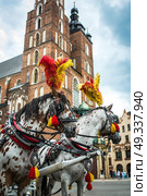 stylized coach with horses in the market square of Krakow. Стоковое фото, агентство Ingram Publishing / Фотобанк Лори