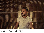 young beard man relaxed in a beach hammock. Стоковое фото, агентство Ingram Publishing / Фотобанк Лори