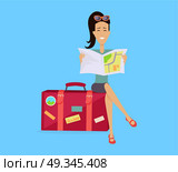 Traveling with Baggage Concept Illustration. Summer vacation concept. Traveling with baggage illustration. Flat style design. Smiling brunette woman seating on suitcase and looking in road map. Isolated on blue background. Стоковая иллюстрация, агентство Ingram Publishing / Фотобанк Лори