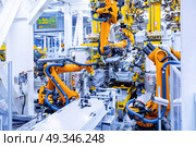 robots in a car plant. robotic arms in a car plant. Стоковое фото, агентство Ingram Publishing / Фотобанк Лори