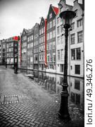 Amsterdam. black and white photo with elements of red. Стоковое фото, агентство Ingram Publishing / Фотобанк Лори