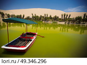  Oasis surrounded by sand dunes near Ica Peru. Стоковое фото, агентство Ingram Publishing / Фотобанк Лори