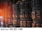 Prayer drum. Cylinder or roller on the axis, containing mantras. Nepal. Prayer drum. . Стоковое фото, агентство Ingram Publishing / Фотобанк Лори