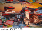 Tibetan flags. Ancient city in Kathmandu Valley. Nepal. Tibetan flags. Стоковое фото, агентство Ingram Publishing / Фотобанк Лори