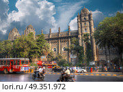 Chhatrapati Shivaji, the former Victoria Terminus - a historical railway station in the Indian city of Mumbai, one of the busiest in India.. Chhatrapati Shivaji. Стоковое фото, агентство Ingram Publishing / Фотобанк Лори
