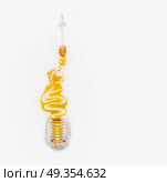Honey poured from glass jar with dipper  on white background, top view. Healthy  food. Стоковое фото, агентство Ingram Publishing / Фотобанк Лори