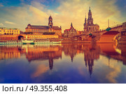 Dresden skyline and Elbe river in Saxony Germany. Dresden skyline reflecion in Elbe river at sunset in Saxony of Germany. Стоковое фото, агентство Ingram Publishing / Фотобанк Лори