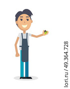 Boy with Grapes Isolated. Winemaker Gather Harvest. Boy with grapes isolated on white. Winemaker gather the harvest. Man propose grapes. Viticulture. Wine degustation. Winemaking concept. Shop assistant sale grape in flat style design. Vector. Стоковая иллюстрация, агентство Ingram Publishing / Фотобанк Лори