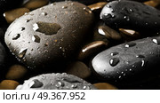 Black wet pebbles background wallpaper. Black wet pebbles background. Стоковое фото, агентство Ingram Publishing / Фотобанк Лори