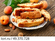 Variety of biscotti - cantucci, cantuccini, kind of biscuit, with the addition of almonds and dried fruits. Italian cantuccini cookies. Стоковое фото, агентство Ingram Publishing / Фотобанк Лори