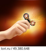 Fidget finger spinner device in hand with fiery lighting effects and soft glowing background realistic vector illustration . Finger Spinner Fidget Hand Realistic . Стоковая иллюстрация, агентство Ingram Publishing / Фотобанк Лори
