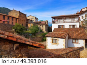 Potes village facades in Cantabria of Spain. Стоковое фото, агентство Ingram Publishing / Фотобанк Лори