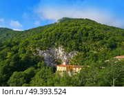 Covadonga Santa Cueva a Catholic sanctuary cave in Asturias near Picos europa mountains. Стоковое фото, агентство Ingram Publishing / Фотобанк Лори