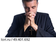 Praying hands priest portrait of male pastor. Стоковое фото, агентство Ingram Publishing / Фотобанк Лори