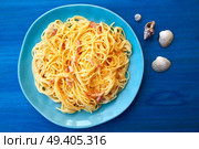 Carbonara italian Spaghetti pasta with bacon and cream. Стоковое фото, агентство Ingram Publishing / Фотобанк Лори