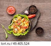 Italian foods concept.Italian style stuffed pasta shells with meat.Stuffed ricotta cheese shells.. Pasta stuffed with meat. Стоковое фото, агентство Ingram Publishing / Фотобанк Лори