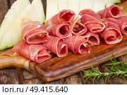 slices  of spanish cured pork ham jamon. Стоковое фото, агентство Ingram Publishing / Фотобанк Лори
