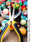 Jewelry making and beading process.Colored beads.Bead mix. Bead for making jewelry. Стоковое фото, агентство Ingram Publishing / Фотобанк Лори