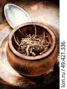 Dried rhizomes and roots of valerian medicinal. Medicinal herbs. Dry root of Valerian. Стоковое фото, агентство Ingram Publishing / Фотобанк Лори