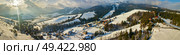 Winter landscape. Panorama of ski resort in Carpathian mountains. Aerial panoramic view. Podobovets and Pilypets villages. Стоковое фото, агентство Ingram Publishing / Фотобанк Лори