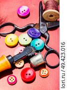 Bright assorted sewing buttons in mix colors.Accessories for tailoring. Sewing tools and accessories. Стоковое фото, агентство Ingram Publishing / Фотобанк Лори